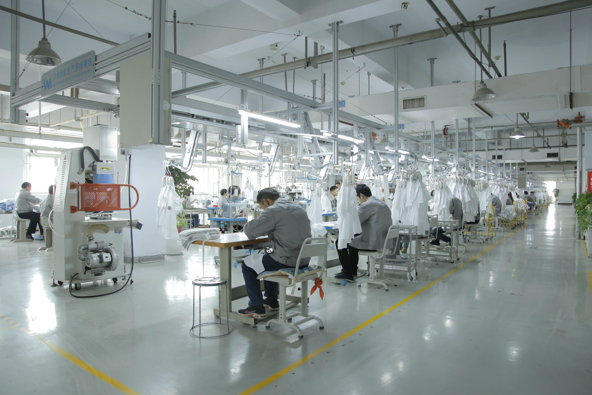 Production floor and overhead garment handling system at our shirt factory